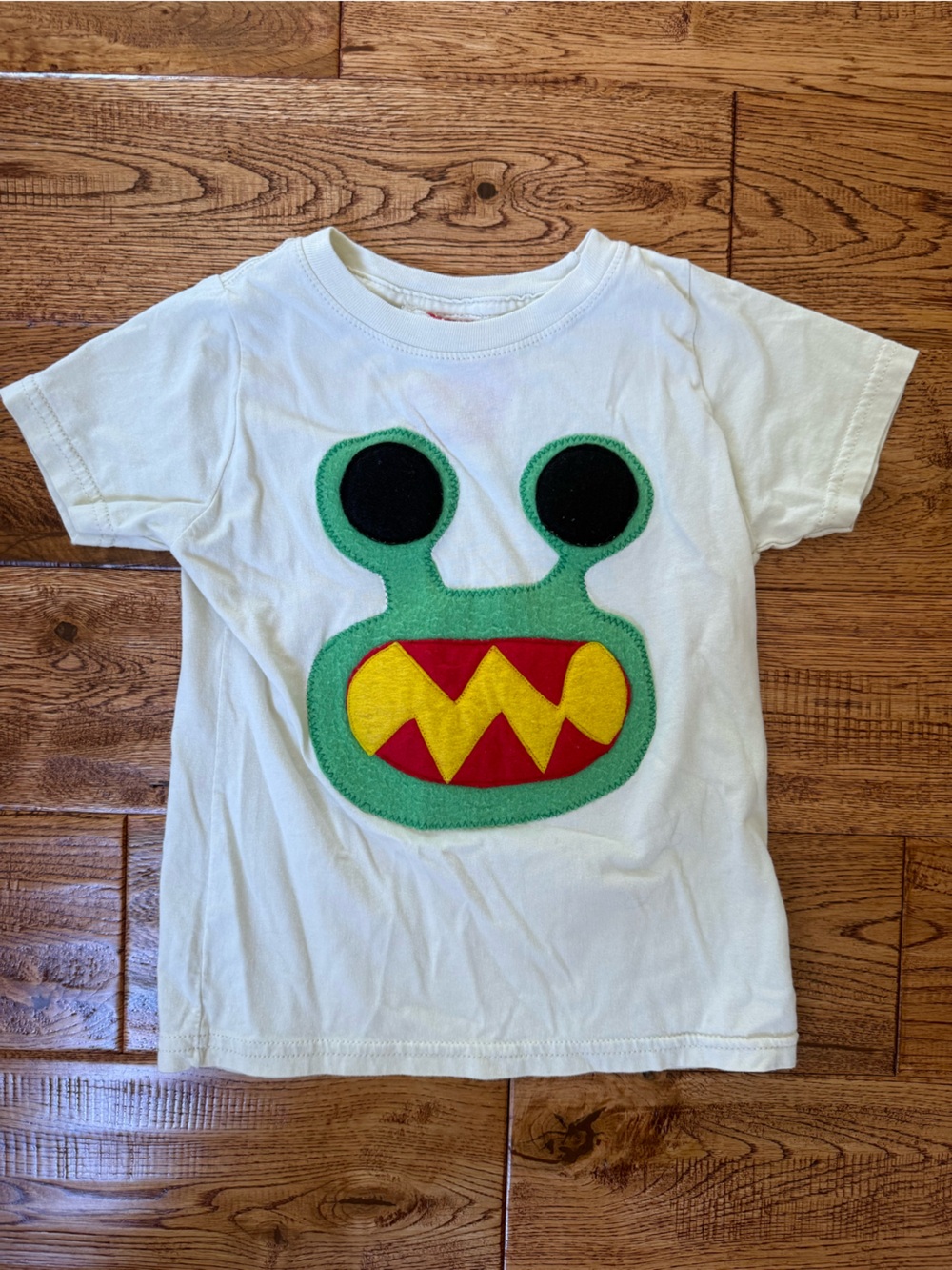 Whimsy Ranch White Kids Tee with Green Monster Patch and Yellow/Red Details